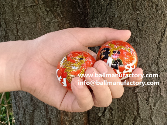 Cloisonne chiming balls with dragon and phoenix